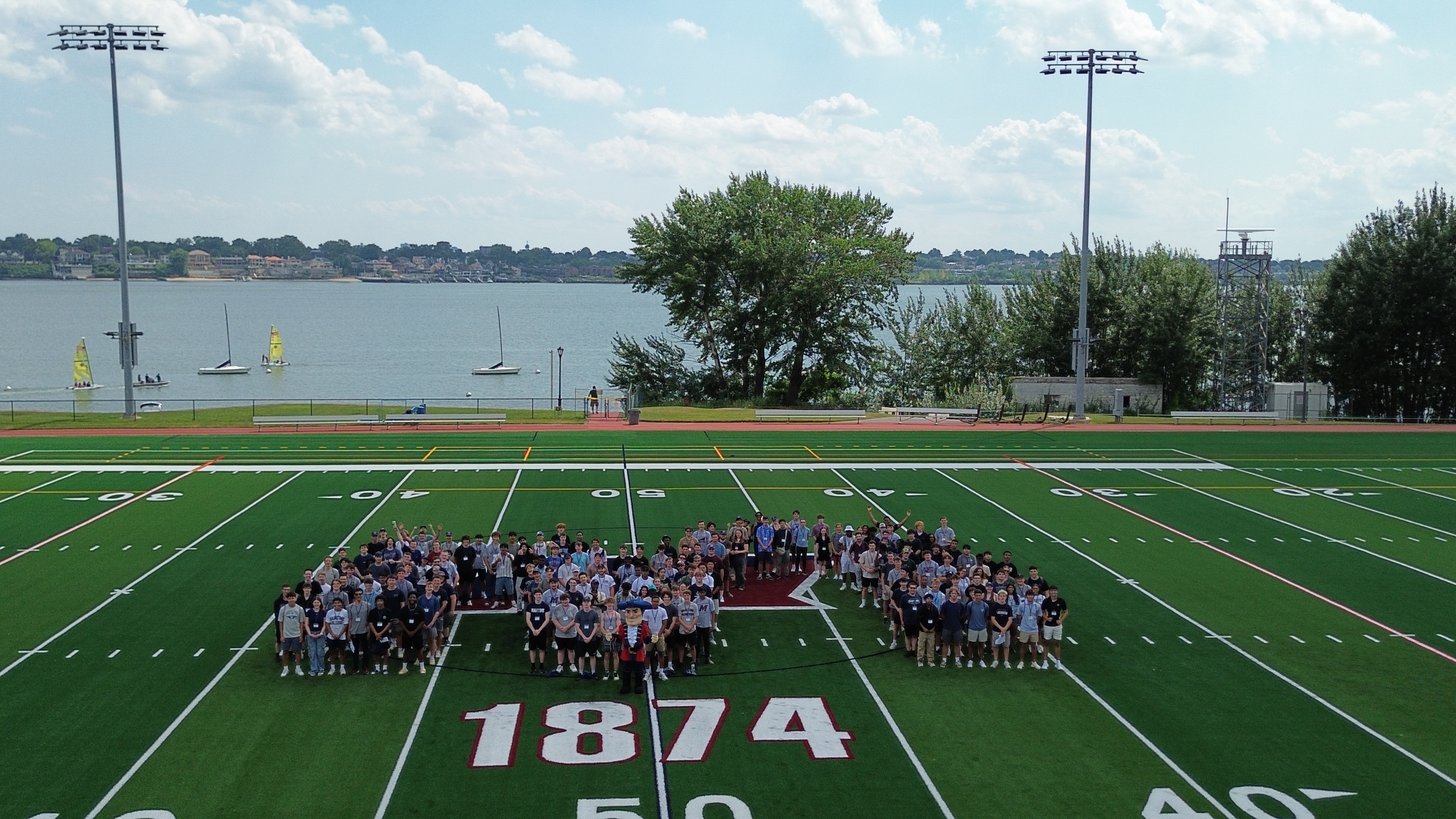 Students making an M on the field