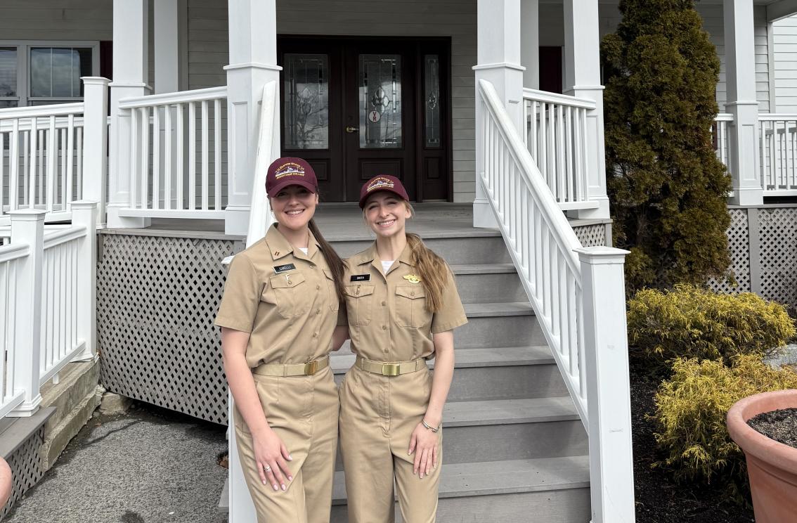 Students standing in front of the Welcome Center